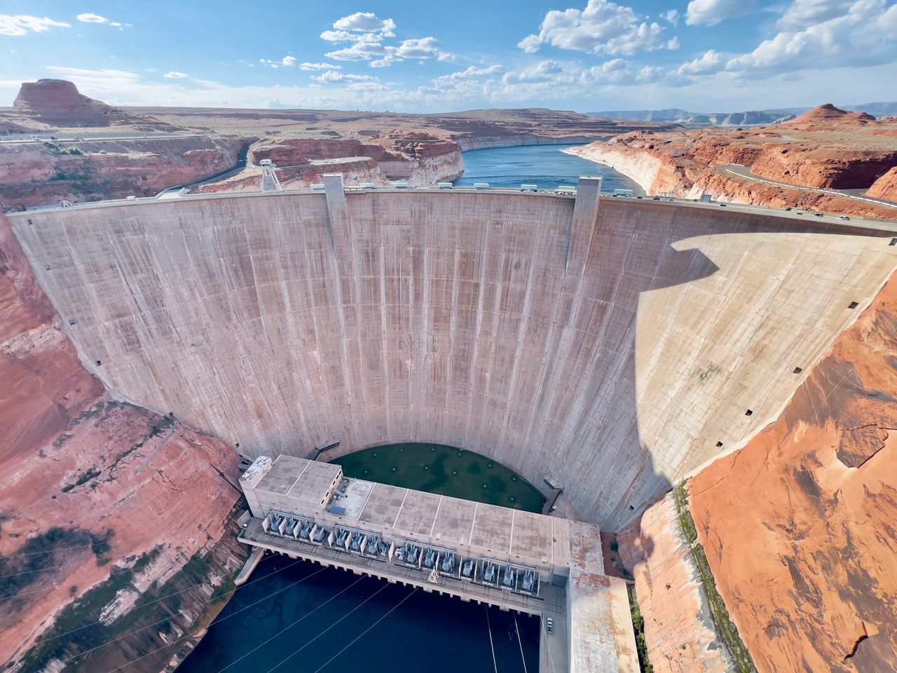Aerial view of Glen Canyon Dam holding back the Colorado River and Lake Powell on the Utah-Arizona border