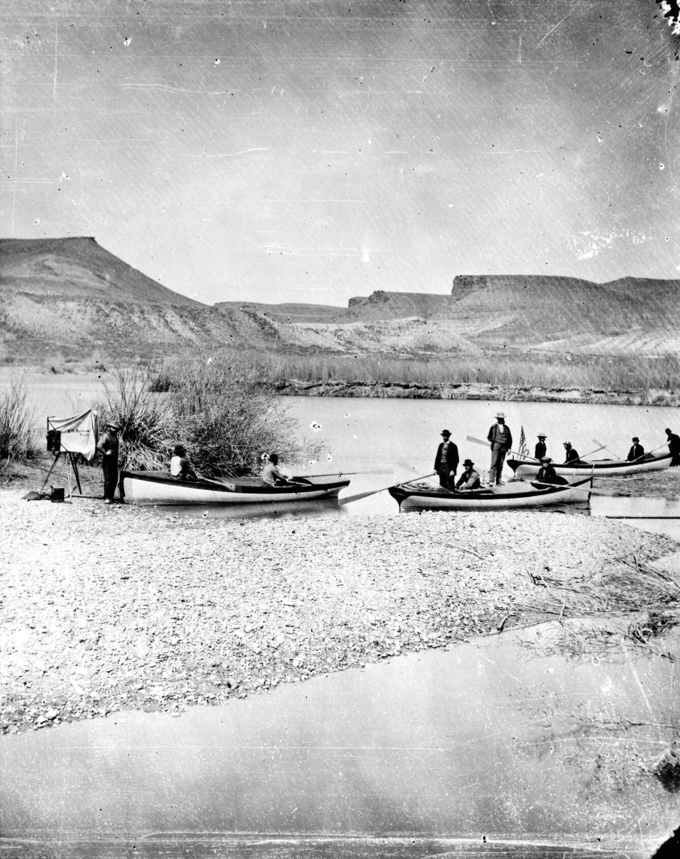 John Wesley Powell's 1869 expedition launching from Green River Station with four wooden dories on the Green River